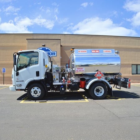 Avgas refueling truck parked outside. 