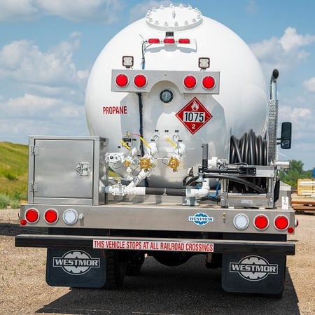 Rear view of a standard load Westmor propane delivery truck. 